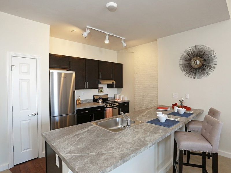 Beautiful countertops, designer cabinetry, stainless steel appliances.