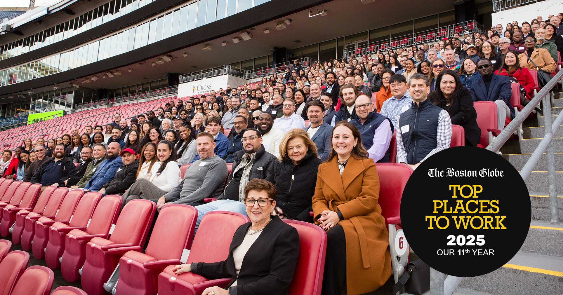 Large team photo at Gillette Stadium. Boston Globe Top Places to Work 2025 - 11th year.