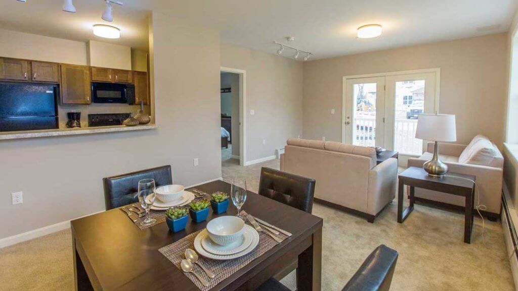 Bright, open floor plan with kitchen view of the dining and living space.