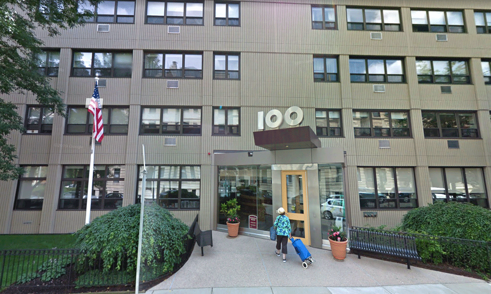 Modern building with iconic logo over door