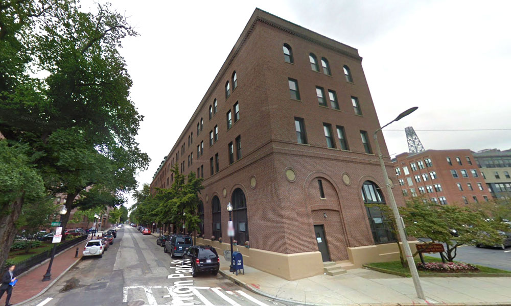 street view photo 3 story brick building