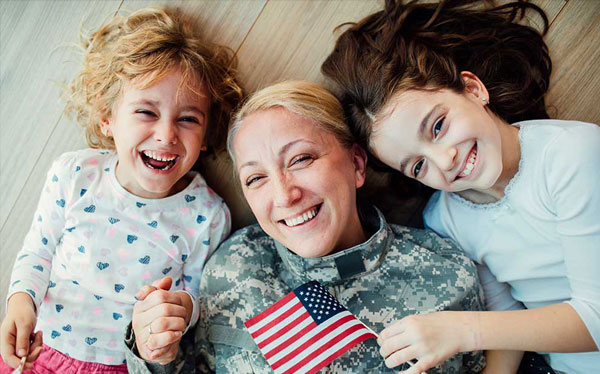 Military mom with her daughters