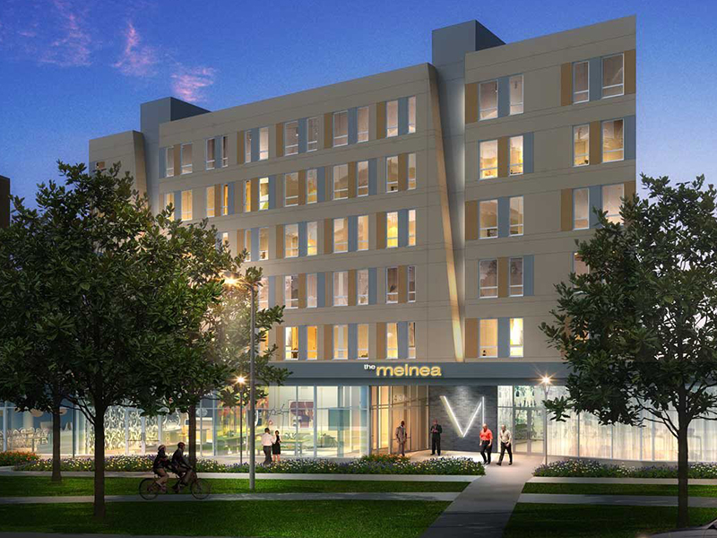 Col modern building, interesting angles, street level businesses, nice landscaped courtyard.